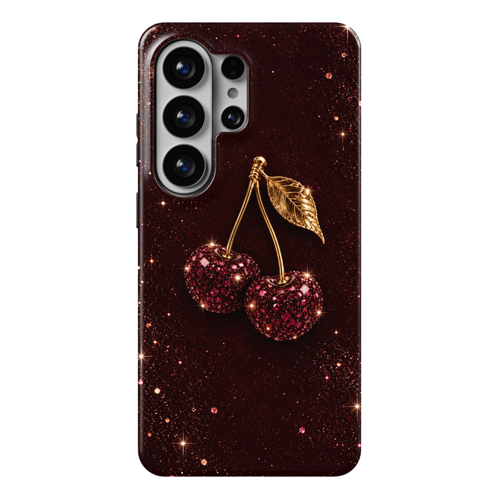 CASELIX Ruby Cherry Sparkle Samsung Galaxy S26 Ultra Tough MagSafe protective phone case featuring a luxurious deep burgundy-red glitter-inspired background adorned with a dazzling pair of ruby-red jeweled cherries. The glamorous design showcases two sparkling cherries composed of brilliant ruby-colored crystals, faceted gemstone-like details, and shimmering crimson highlights. Elegant metallic gold-inspired stems connect the cherries beneath a beautifully detailed golden leaf, creating a sophisticated jewe