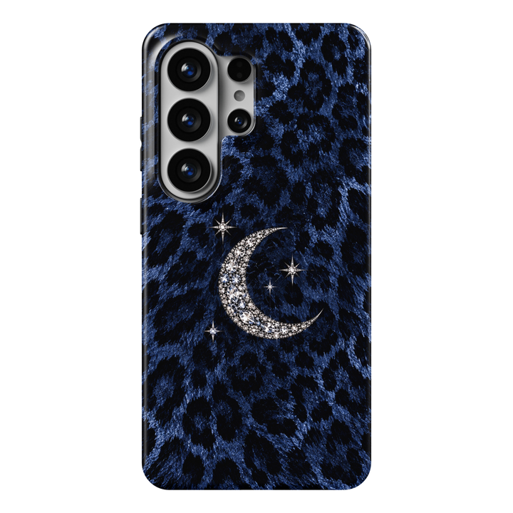 CASELIX Midnight Moon Leopard Samsung Galaxy S26 Ultra Tough MagSafe protective phone case featuring a luxurious deep sapphire-blue and midnight-black leopard print pattern adorned with a sparkling silver crescent moon and delicate crystal stars. The sophisticated design showcases irregular black leopard spots against a richly textured royal-blue, faux-fur-inspired background, creating a bold and mysterious animal print aesthetic. At the center, an elegant crescent moon features intricately arranged diamond