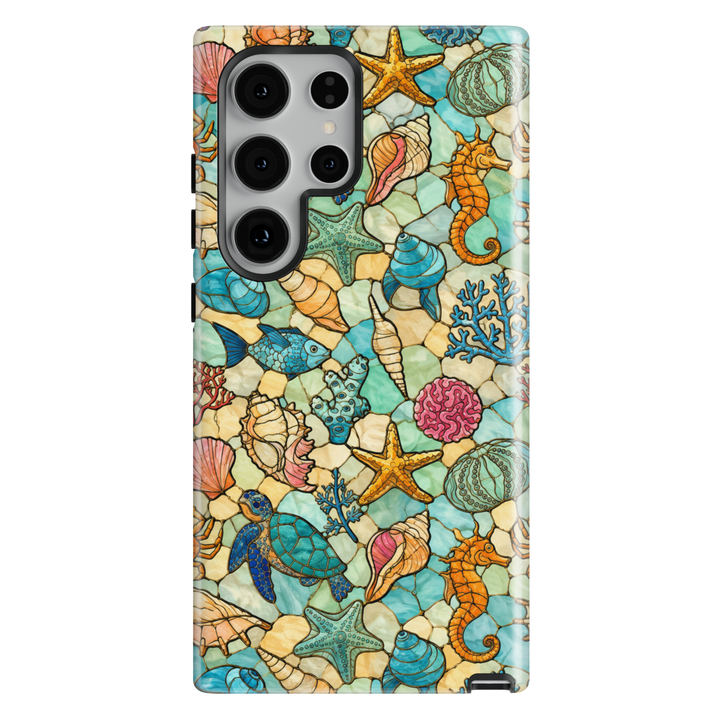 Samsung Galaxy phone case featuring sea turtles, seahorses, starfish, tropical fish, seashells, and coral in a colorful ocean mosaic design.