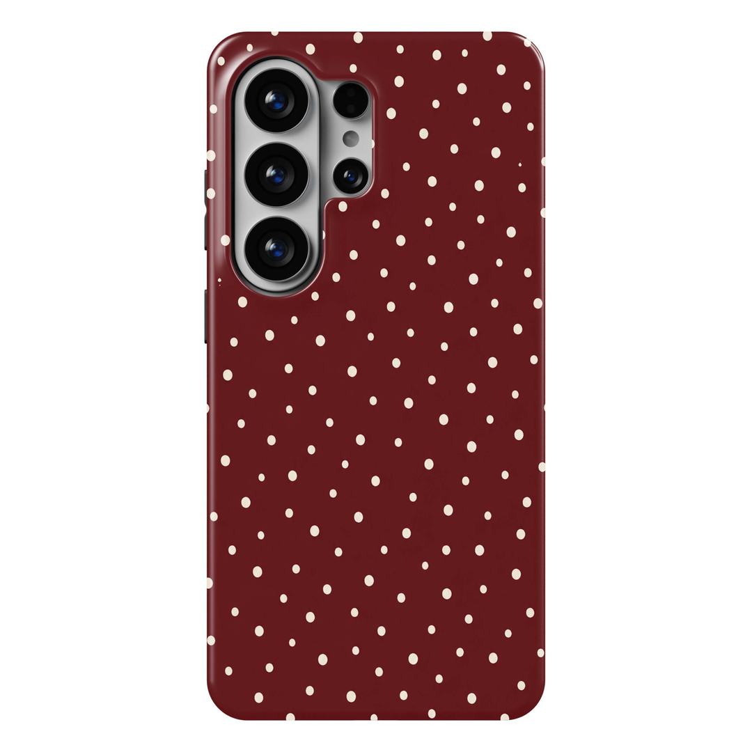 Cherry Dots Samsung Galaxy S26 Ultra case featuring a deep cherry red and burgundy background with scattered irregular cream polka dots, a feminine minimalist Galaxy S26 Ultra tough phone case with cute dotted pattern for Samsung Galaxy S26, S26 Plus and S26 Ultra.