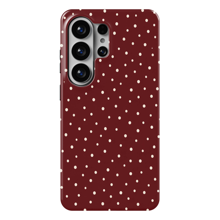 Cherry Dots Samsung Galaxy S26 Ultra case featuring a deep cherry red and burgundy background with scattered irregular cream polka dots, a feminine minimalist Galaxy S26 Ultra tough phone case with cute dotted pattern for Samsung Galaxy S26, S26 Plus and S26 Ultra.