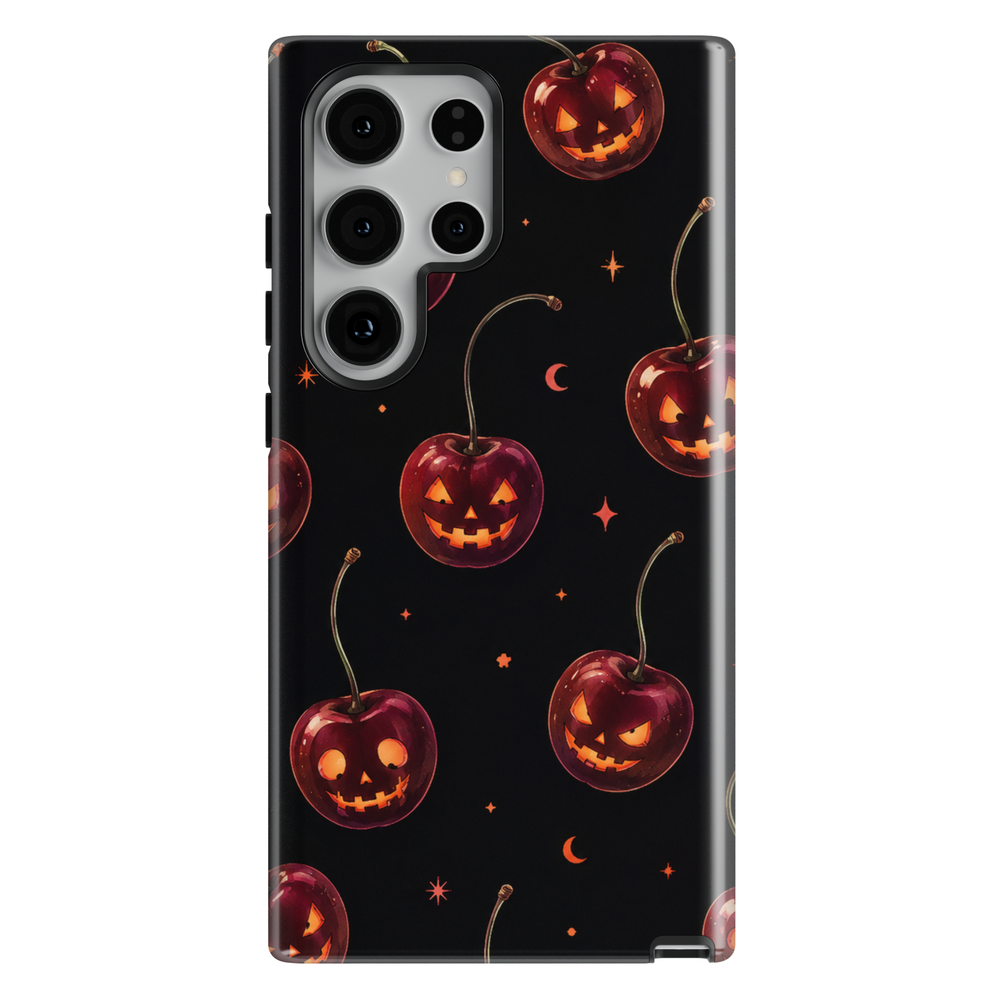 Black Samsung Galaxy Halloween case featuring cherry red jack-o-lantern pumpkins, crescent moons and tiny stars.