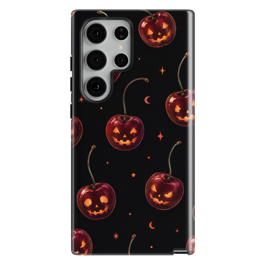 Black Samsung Galaxy Halloween case featuring cherry red jack-o-lantern pumpkins, crescent moons and tiny stars.