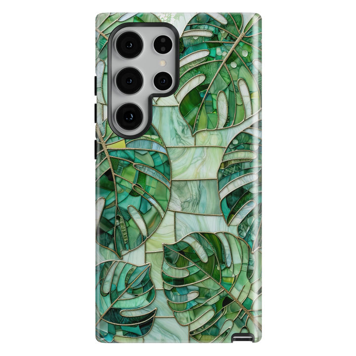 Samsung Galaxy case featuring emerald green monstera leaves in a stained glass botanical mosaic design.