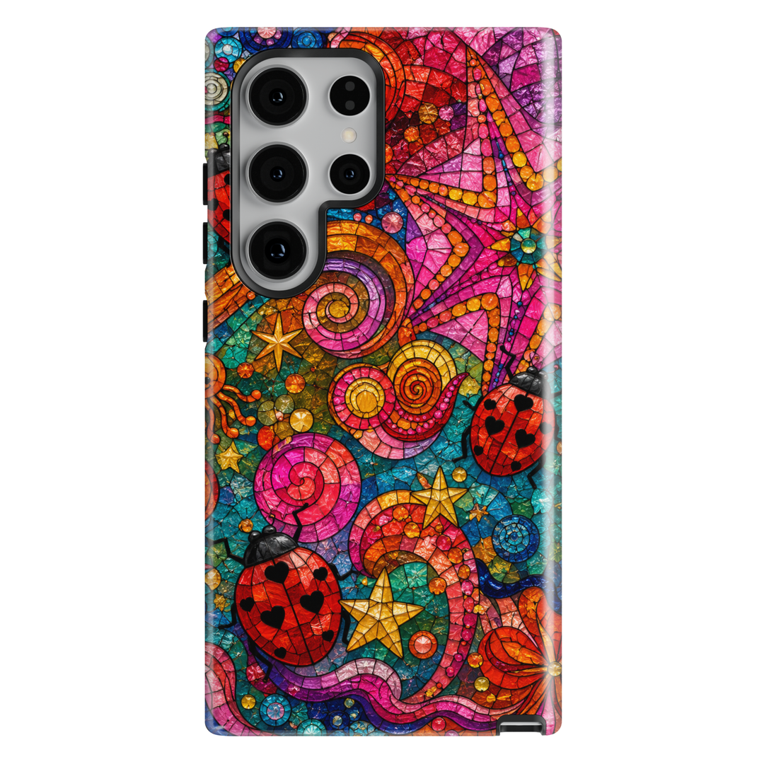 Colorful Samsung Galaxy case featuring ladybugs, stained glass mosaic artwork, vibrant swirls, and whimsical stars.