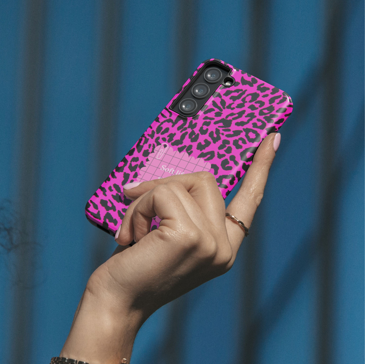 Hot pink leopard phone case with quote soft life strong boundaries on a protective iPhone and Samsung Galaxy phone case for women