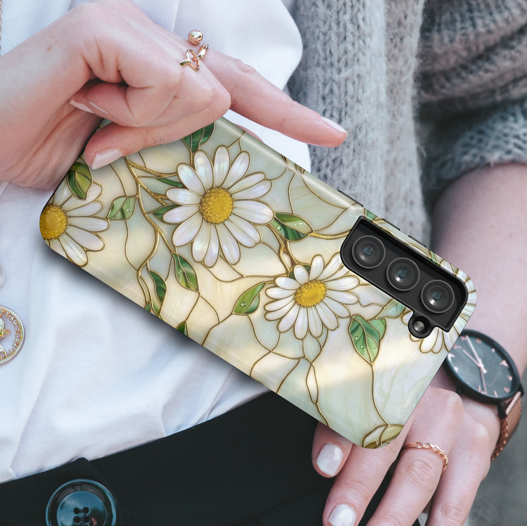 White daisy floral Samsung Galaxy S26 Ultra case with gold accents and soft neutral background, elegant protective phone case.