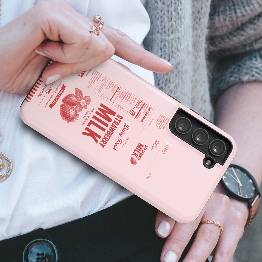 Pink strawberry milk carton Samsung Galaxy phone case featuring vintage dairy packaging design, strawberries, and retro food aesthetic artwork.