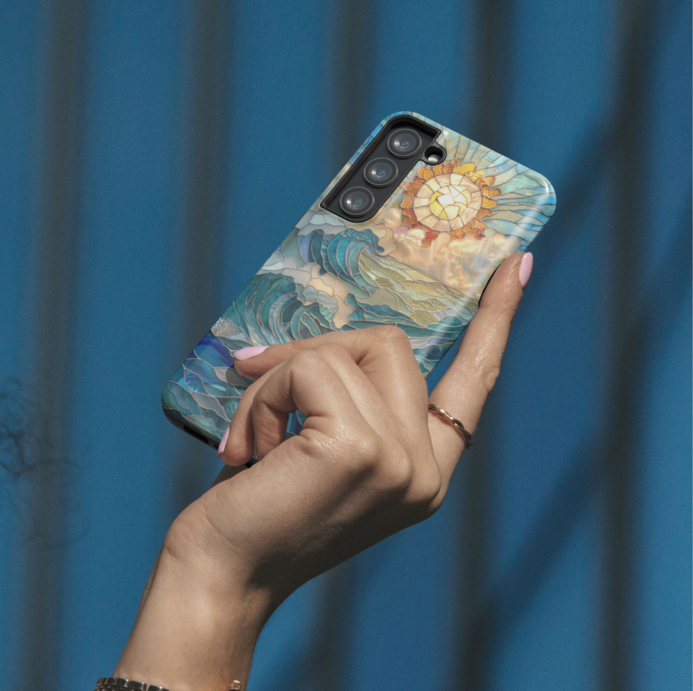 Ocean sunrise stained glass art phone case with blue waves and golden sun on a protective iPhone and Samsung Galaxy phone case