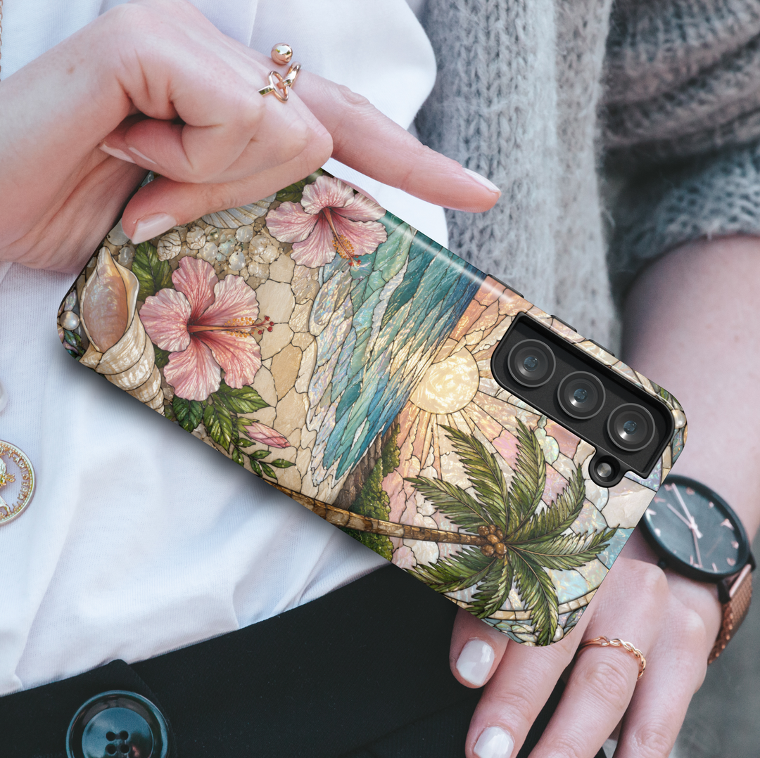 Tropical Samsung Galaxy S26 Ultra case featuring hibiscus flowers, beach sunset scenery, seashells, and ocean waves.