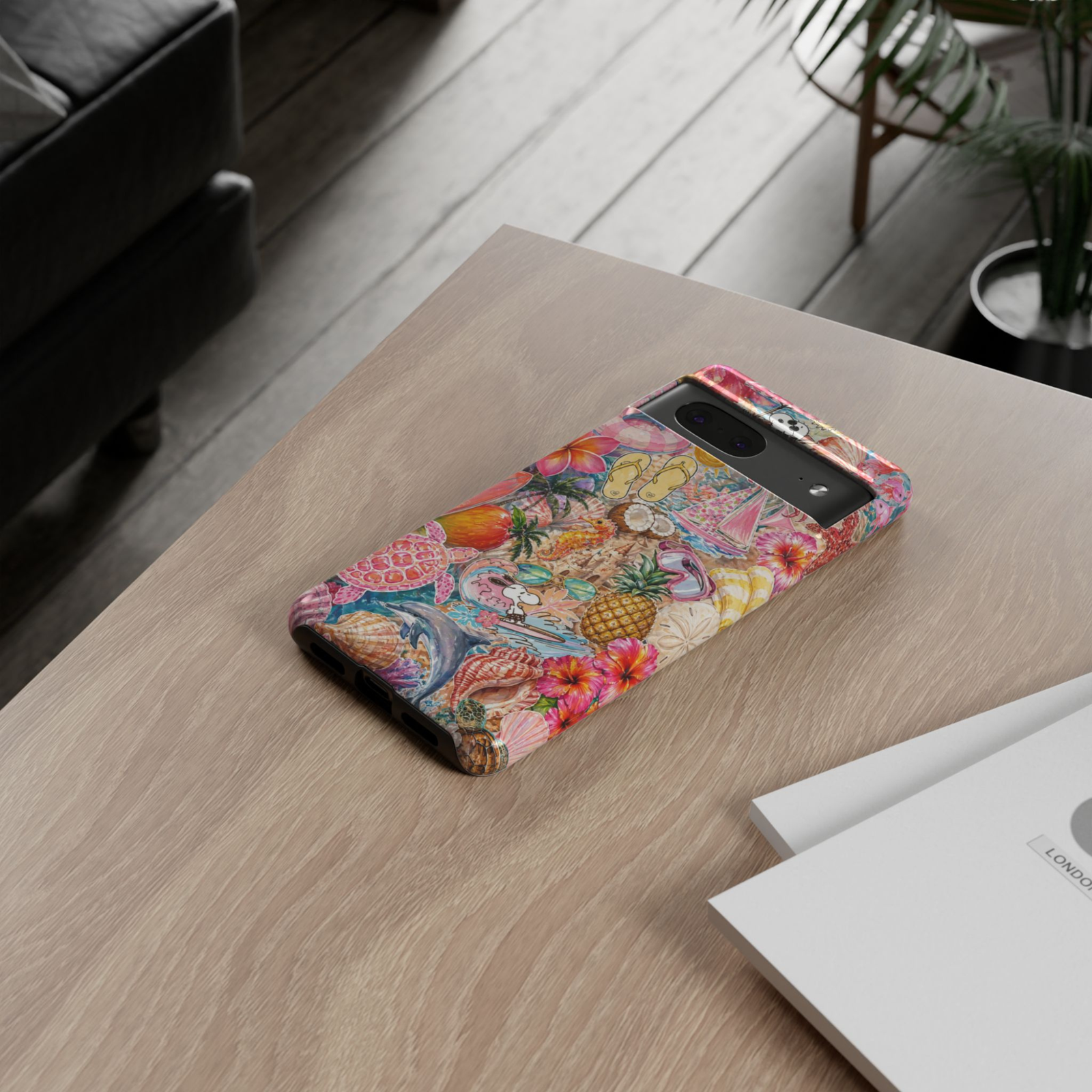 Tropical hibiscus beach Google Pixel 10 protective phone case featuring watercolor seashells, coral, starfish, and colorful coastal floral artwork.