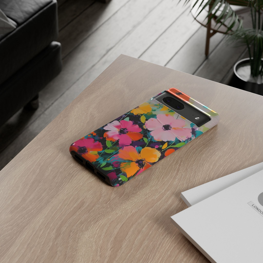Electric Bloom Google Pixel 10 Pro protective phone case featuring colorful hand-painted flowers in pink, orange, yellow, and teal with expressive brushstroke artwork.