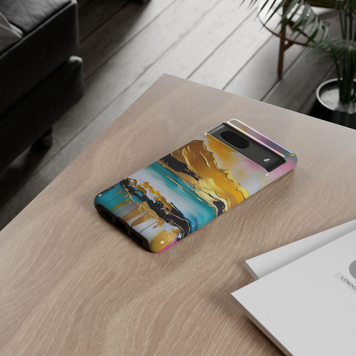 Gilded Horizon Google Pixel 10 Pro protective phone case featuring a modern abstract coastal landscape with gold mountains, turquoise water, and soft pink sunset accents.
