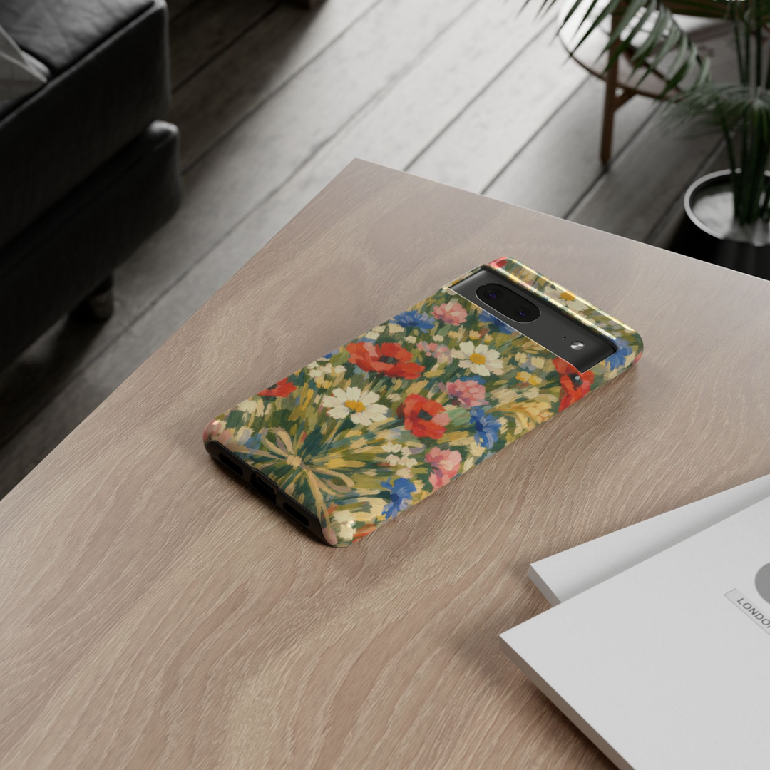 Wildflower Symphony Google Pixel 10 Pro protective phone case featuring an impressionist oil painting of colorful wildflowers including daisies and poppies.