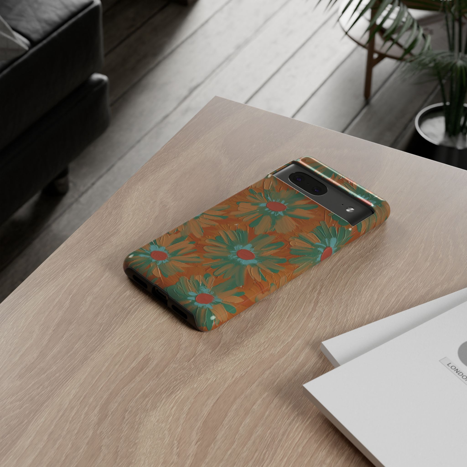 Autumn Atelier Google Pixel 10 Pro protective phone case featuring hand-painted floral artwork in terracotta, sage green, and warm autumn tones.