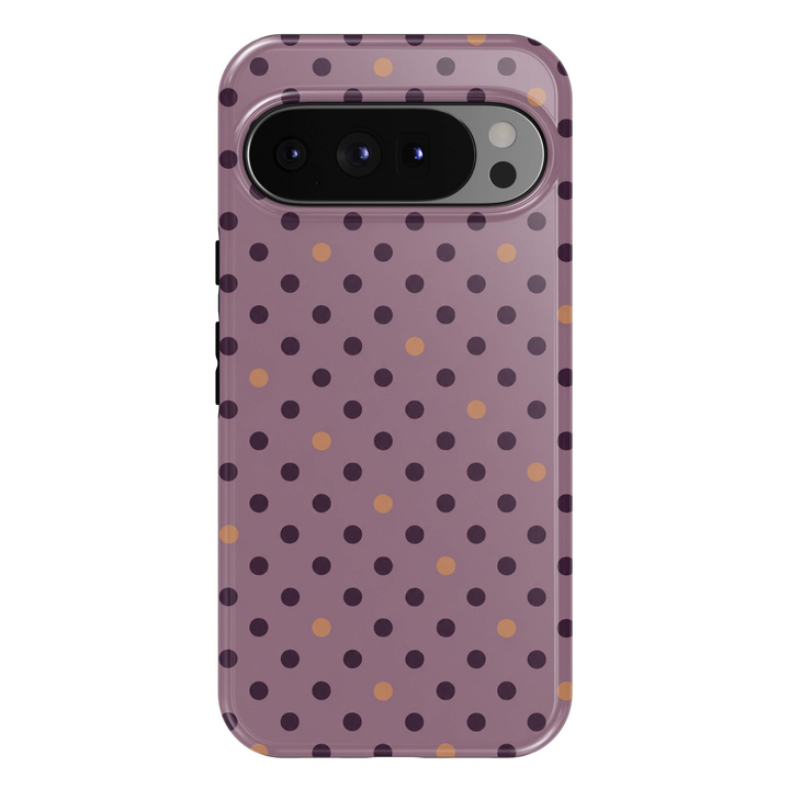 Mauve Confetti Dots Google Pixel case featuring a dusty mauve purple background decorated with evenly spaced dark plum polka dots and scattered warm caramel accents. A playful minimalist dotted design with a glossy finish.