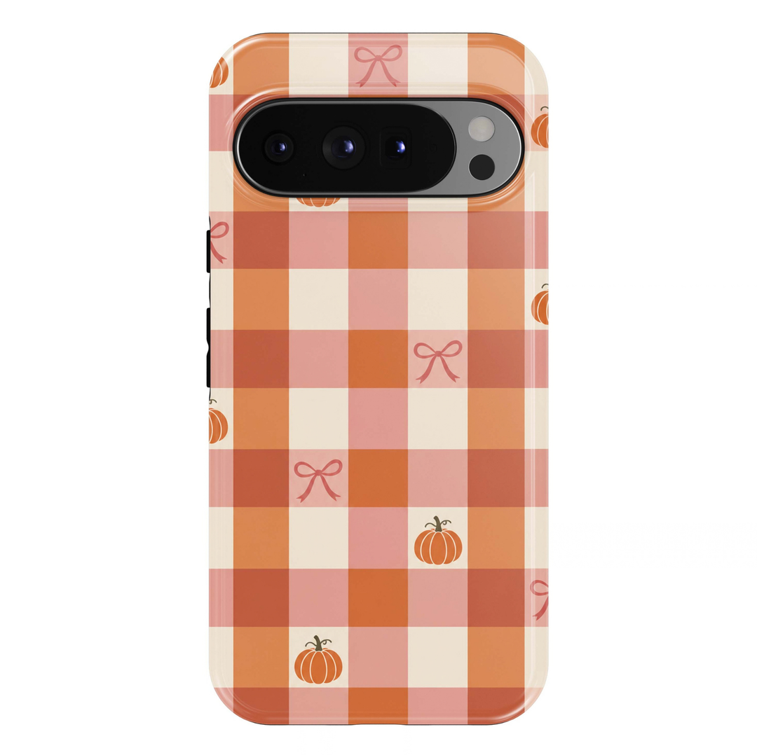 Pumpkin Spice Gingham Google Pixel case featuring a charming orange, blush pink and cream checkered pattern decorated with miniature autumn pumpkins and delicate pink ribbon bows. A cute coquette-inspired fall design with a glossy finish.