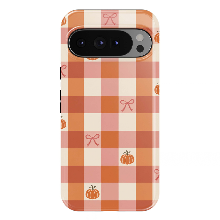 Pumpkin Spice Gingham Google Pixel case featuring a charming orange, blush pink and cream checkered pattern decorated with miniature autumn pumpkins and delicate pink ribbon bows. A cute coquette-inspired fall design with a glossy finish.