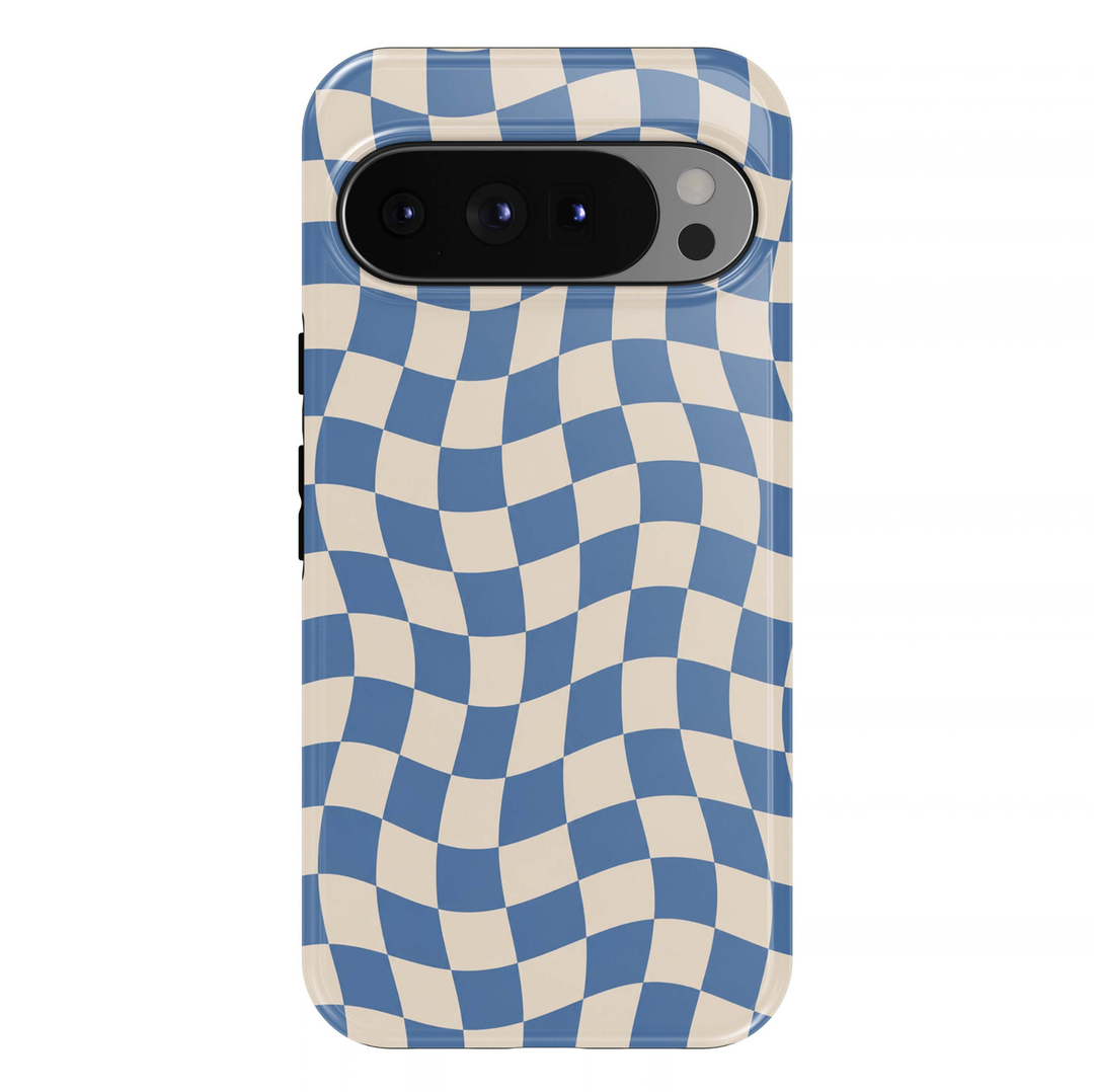 Wavy Blue Checkered Google Pixel case featuring a retro-inspired checkerboard pattern with flowing, curved squares in dusty blue and warm ivory. The playful geometric design creates a trendy, minimalist aesthetic with a glossy finish.