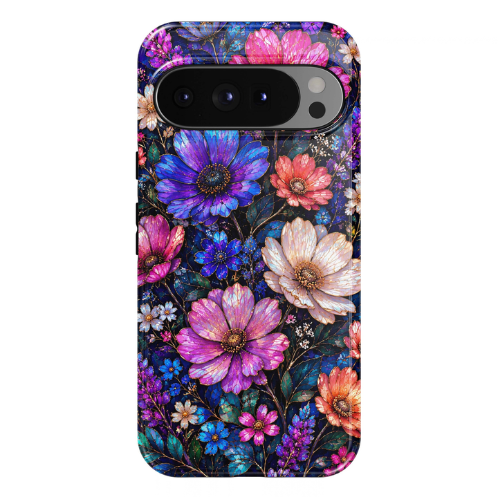 Midnight Wildflowers Google Pixel case featuring vibrant violet, electric-blue, fuchsia-pink, coral and ivory wildflowers with iridescent petals, delicate champagne-gold outlines, golden floral centers, teal-green foliage and tiny colorful blossoms against a rich midnight-navy botanical background.