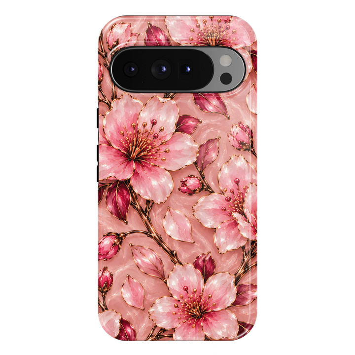 Pink Cherry Blossom Google Pixel case featuring delicate blush-pink and rosy cherry blossom flowers with shimmering champagne-gold outlines, golden stamens, deep pink flower buds, rose-colored leaves and elegant gold branches on a soft pearlescent pink background.