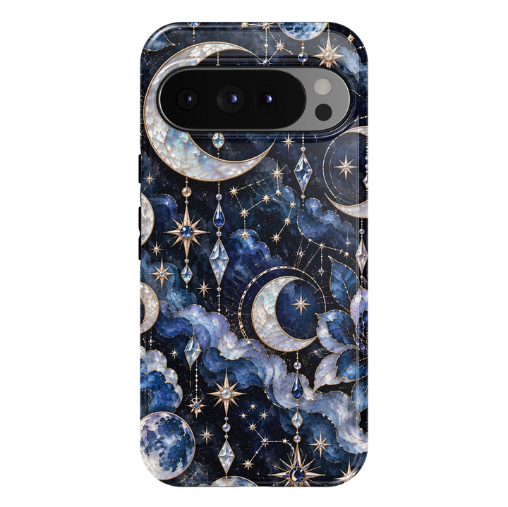 Blue Moon Society Google Pixel case featuring pearl crescent moons, cobalt blue clouds, sapphire crystal charms, gold stars and constellation details on a midnight navy background.