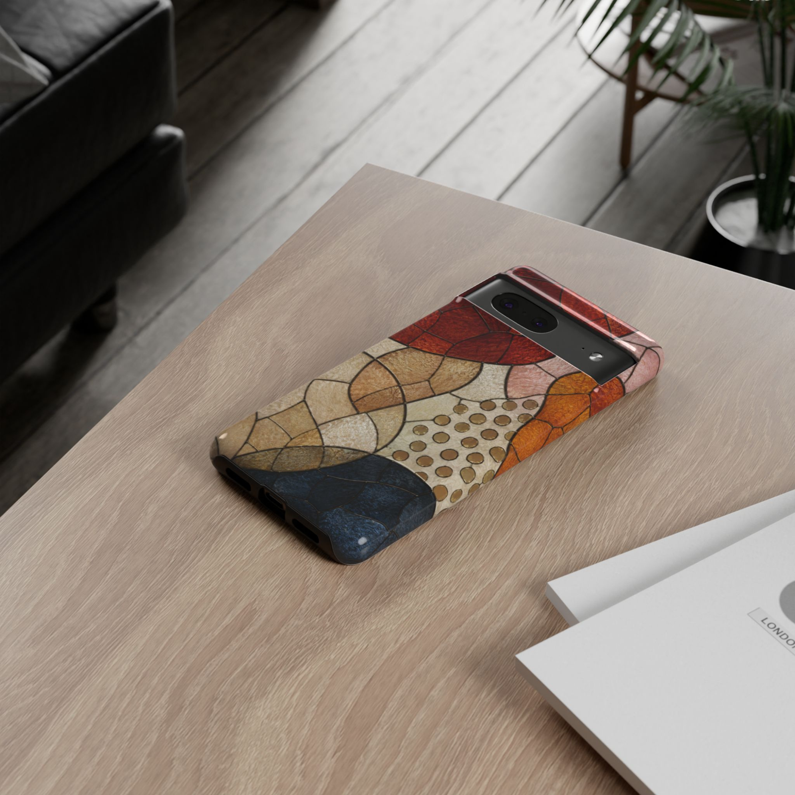 Google Pixel 10 protective phone case featuring a modern abstract stained glass mosaic in terracotta, beige, ivory, blush, and navy geometric shapes.