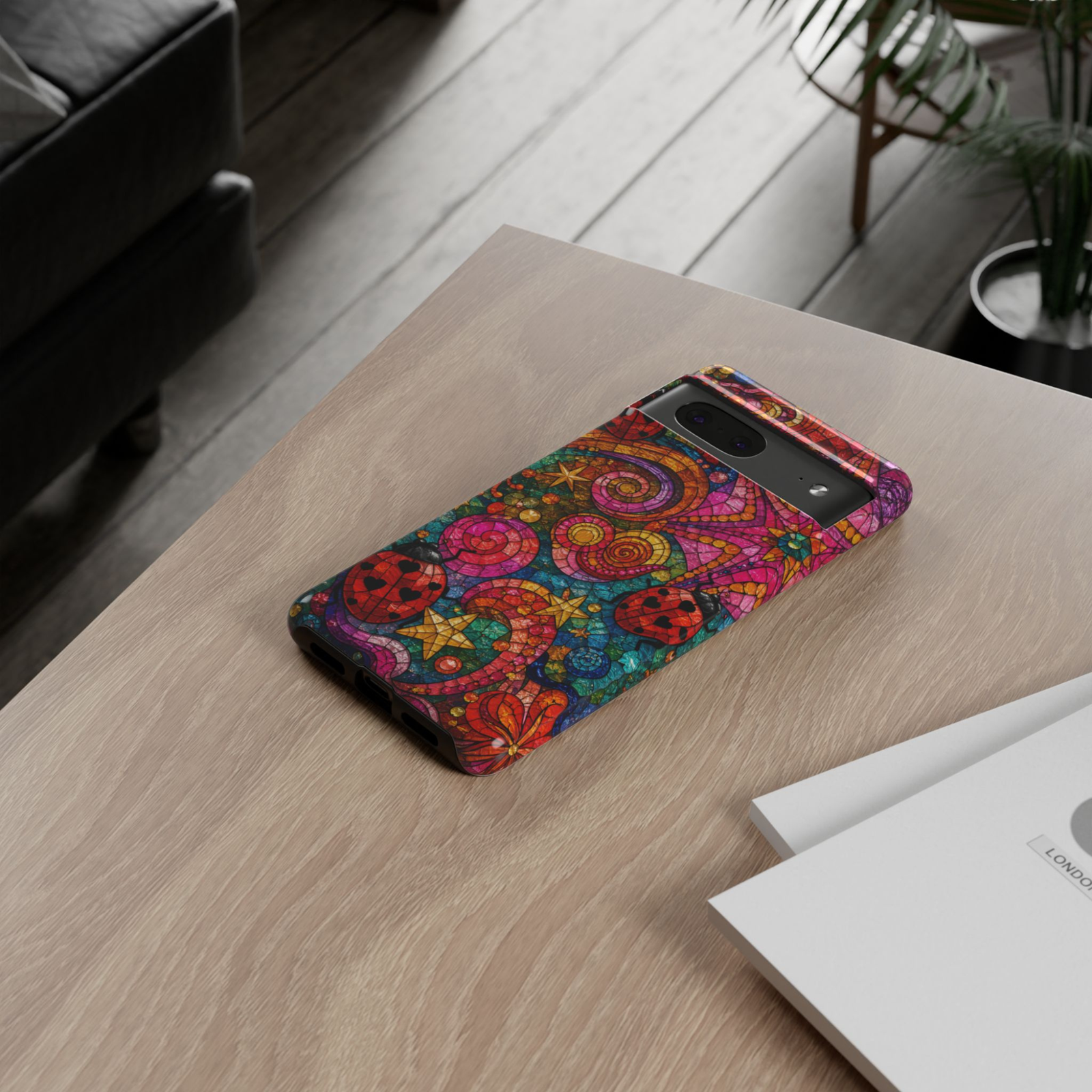 Protective Google Pixel 10 Pro phone case featuring a vibrant stained glass rainbow galaxy with swirling cosmic colors, stars, and celestial artwork.