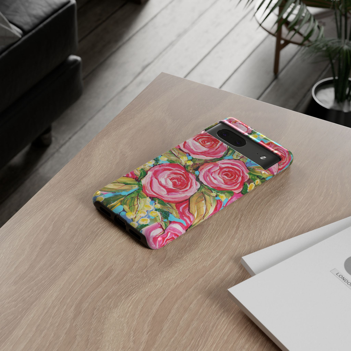 Google Pixel 10 protective phone case featuring a hand-painted bouquet of pink roses with green leaves, delicate yellow flowers, and colorful painterly floral artwork.