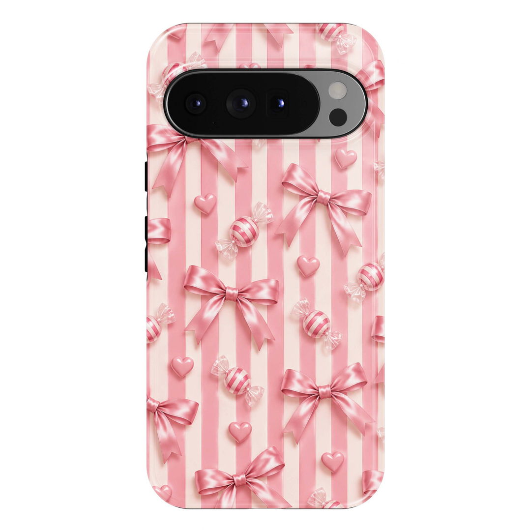 Pink Sugar Rush Google Pixel case featuring pink and white vertical stripes, satin ribbon bows, striped pink candies and tiny pink hearts in a playful coquette aesthetic.