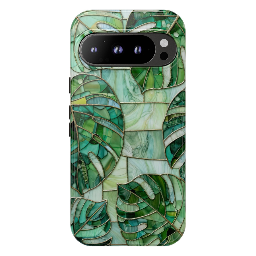 Google Pixel 10 protective phone case featuring a stained glass mosaic design with emerald green monstera leaves, tropical foliage, and elegant botanical artwork.