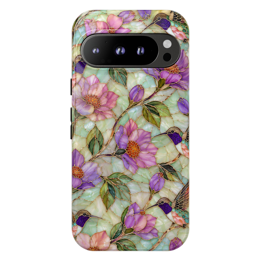 Protective Google Pixel 10 Pro phone case featuring hummingbirds flying among lavender flowers and green leaves in a stained-glass botanical design with durable dual-layer protection.