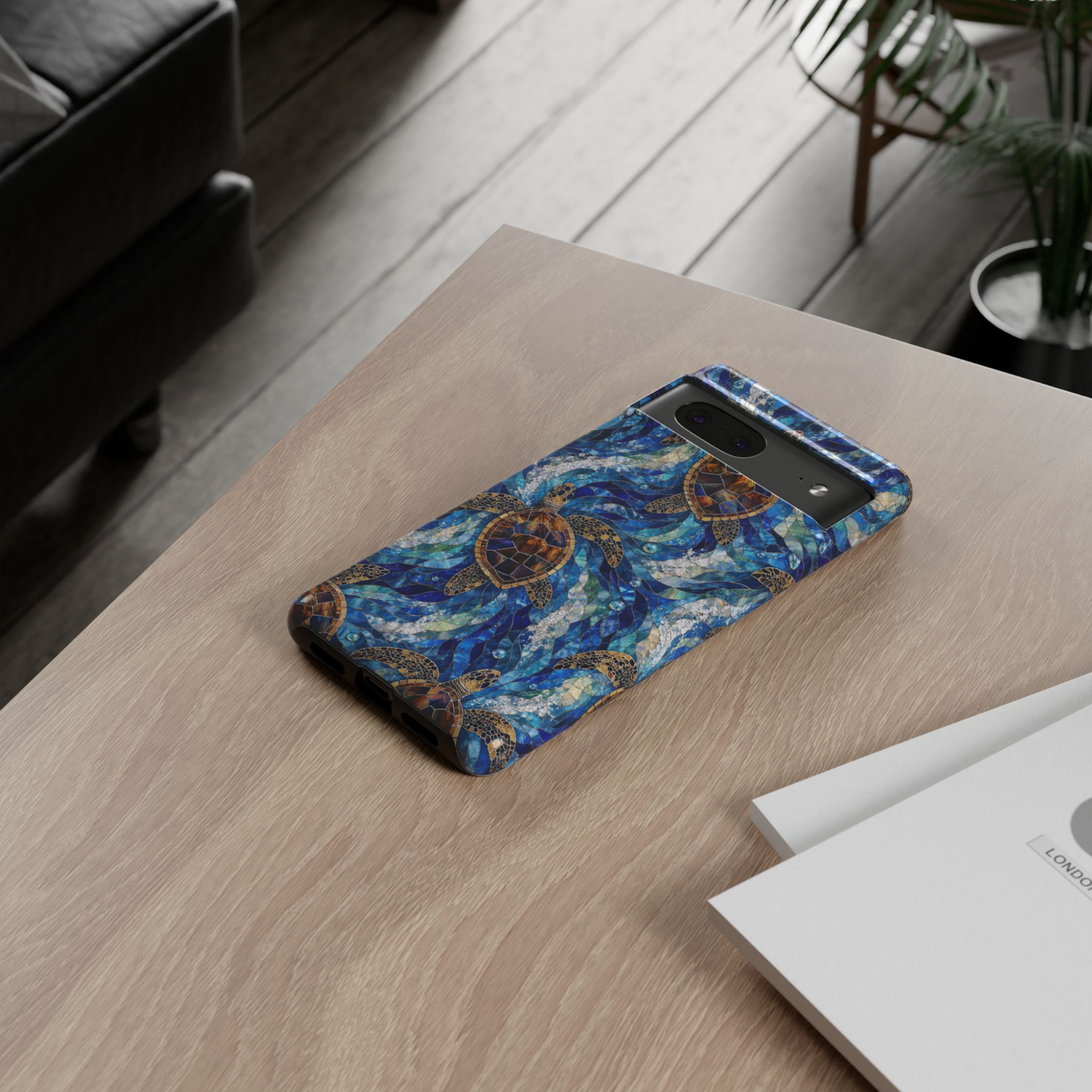 Protective Google Pixel 10 Pro phone case featuring sea turtles swimming through blue ocean waves in a stained-glass mosaic design with durable dual-layer protection.