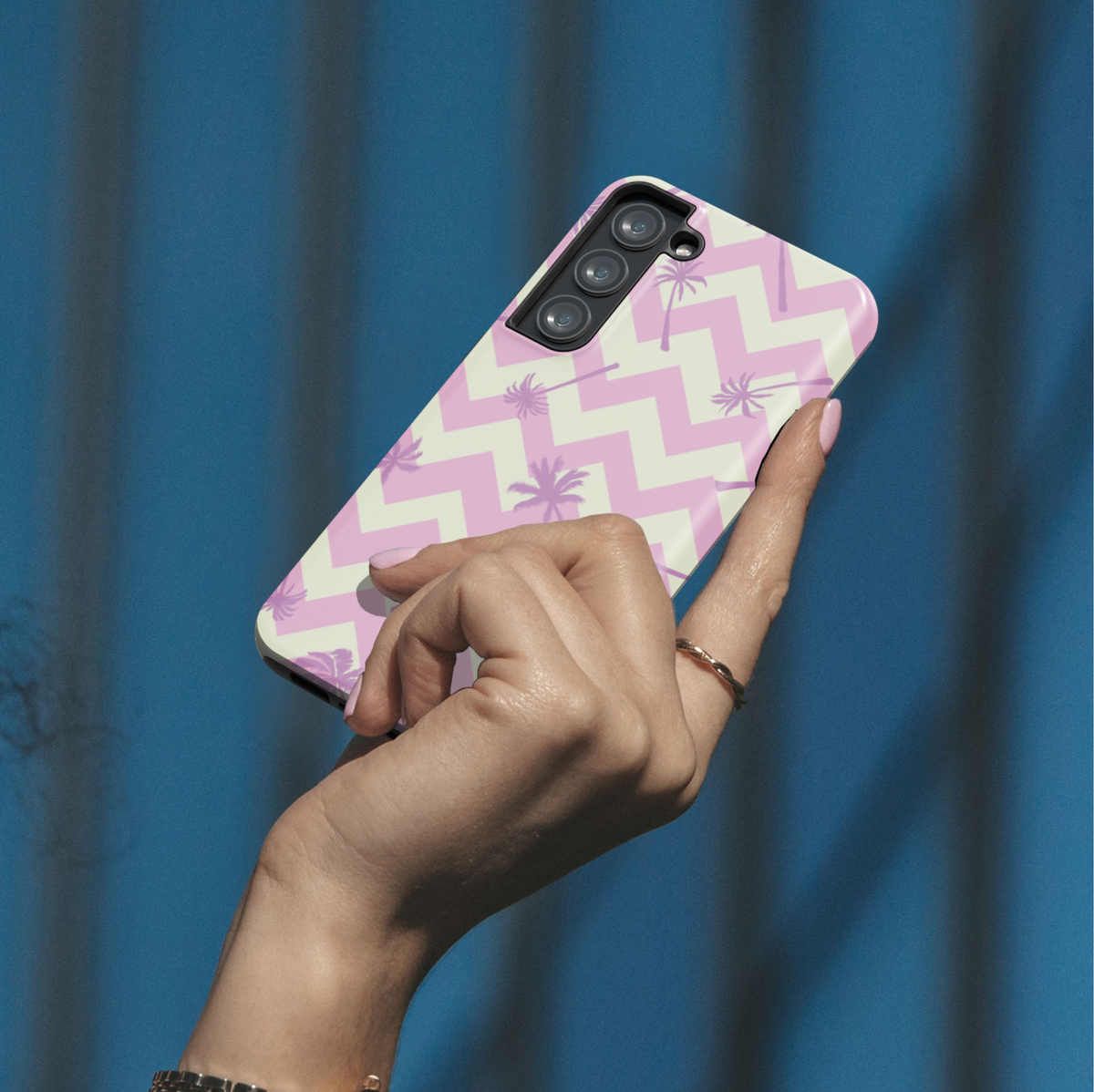 Girly Samsung Galaxy phone case with pastel pink and cream chevron pattern and lavender palm tree accents – tropical beach-inspired design for Galaxy S24 Ultra, S25, S24 FE.