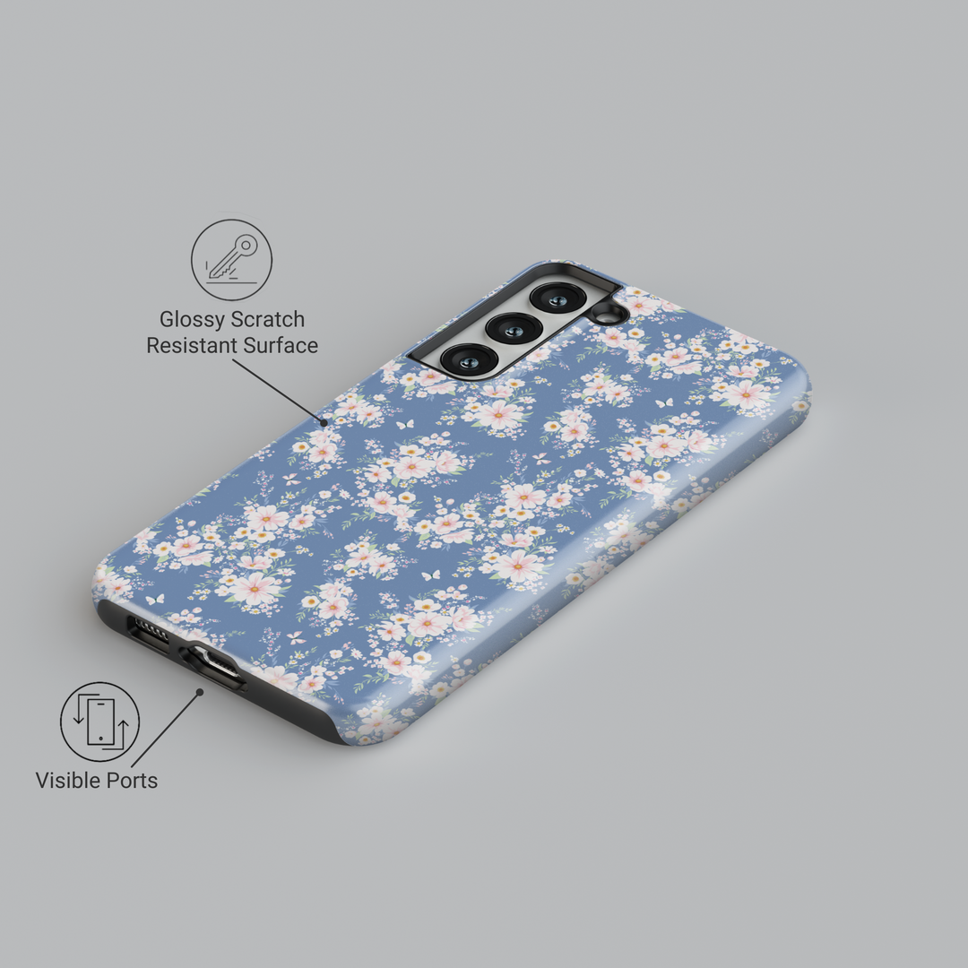 Dusty blue Samsung Galaxy phone case with light pink floral clusters – elegant feminine cover for spring vibes