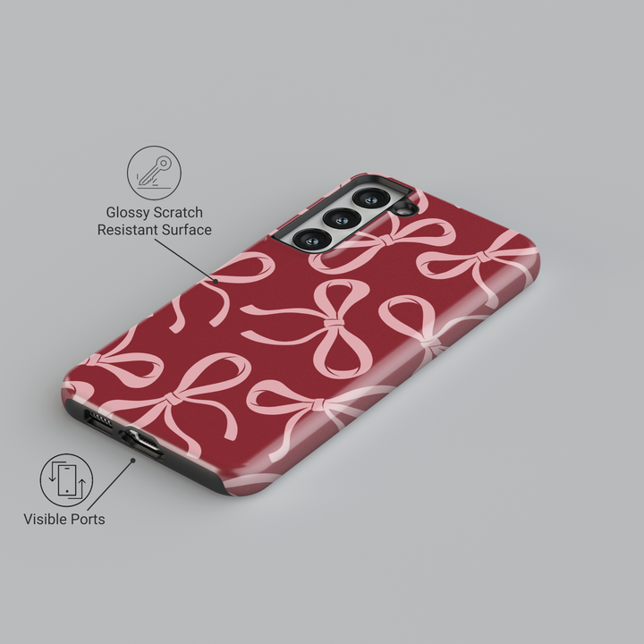 Red Samsung Galaxy case with large pink bow pattern – bold coquette aesthetic phone cover for women, glossy and protective