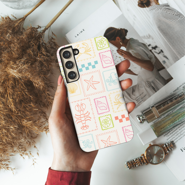Samsung Galaxy S25 Ultra & S24 FE Case – Pastel Beach Patch Design with Starfish, Crabs, Shells, Lobsters, and Ocean Icons on Cream Background