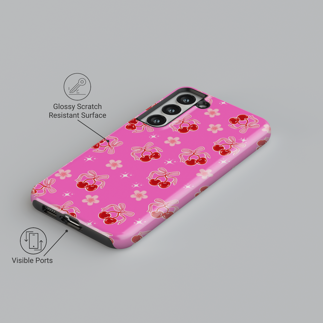 Coquette pink Samsung Galaxy case with red cherries, heart bows, and floral accents – cute girly aesthetic protective phone cover