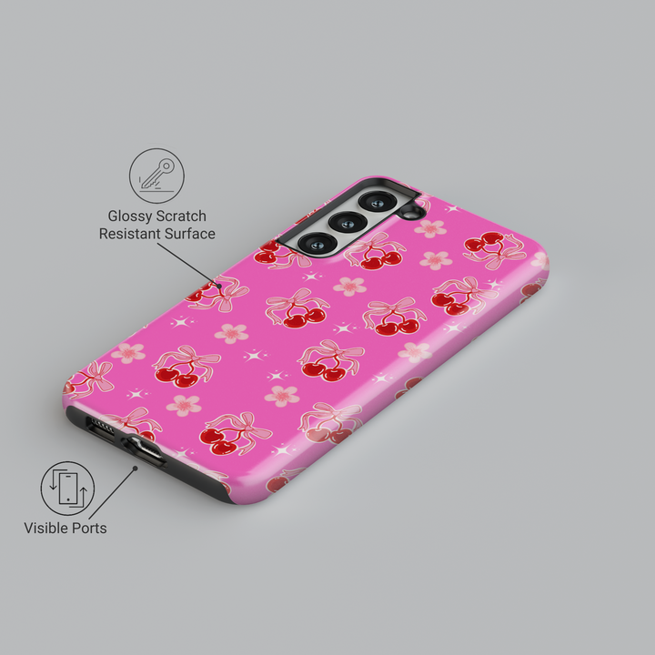 Coquette pink Samsung Galaxy case with red cherries, heart bows, and floral accents – cute girly aesthetic protective phone cover
