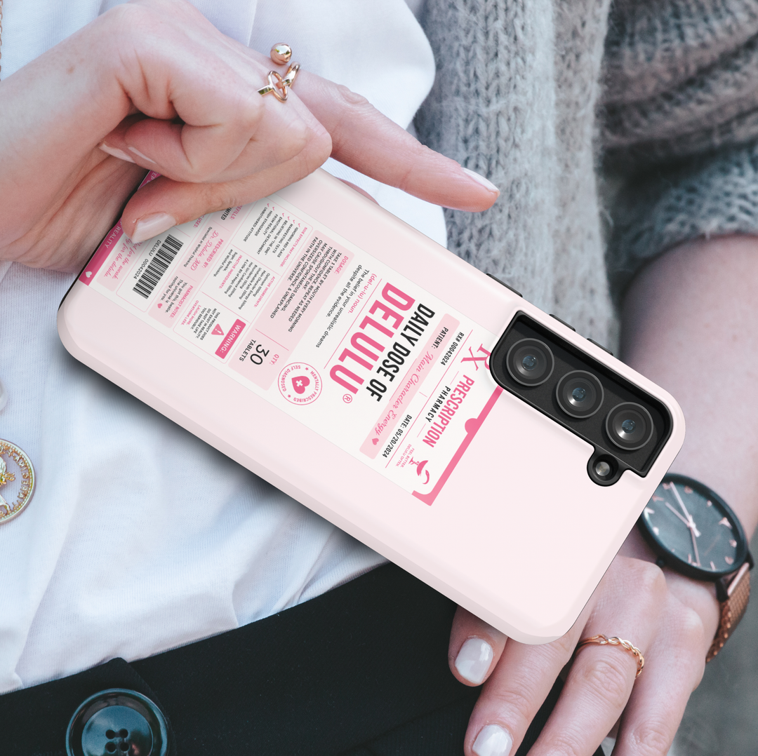 Funny pink Samsung Galaxy case featuring a Daily Dose of Delulu prescription label with humorous pharmacy-inspired design.