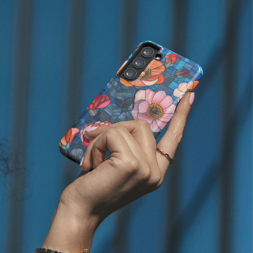 Stained glass floral phone case with dark blue background and pink orange flowers