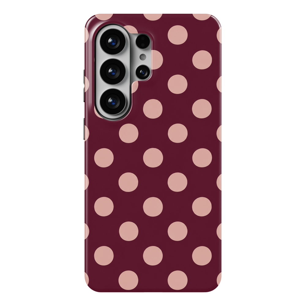 Oxblood Affair Samsung Galaxy case featuring evenly spaced blush pink polka dots on a deep burgundy background with a glossy finish.