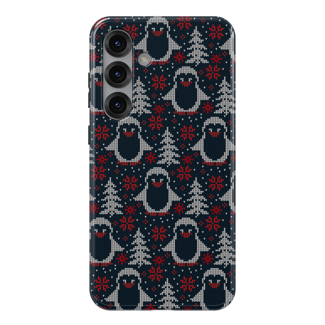 Navy blue Christmas phone case with white knitted penguins, red snowflakes, and winter trees sweater pattern
