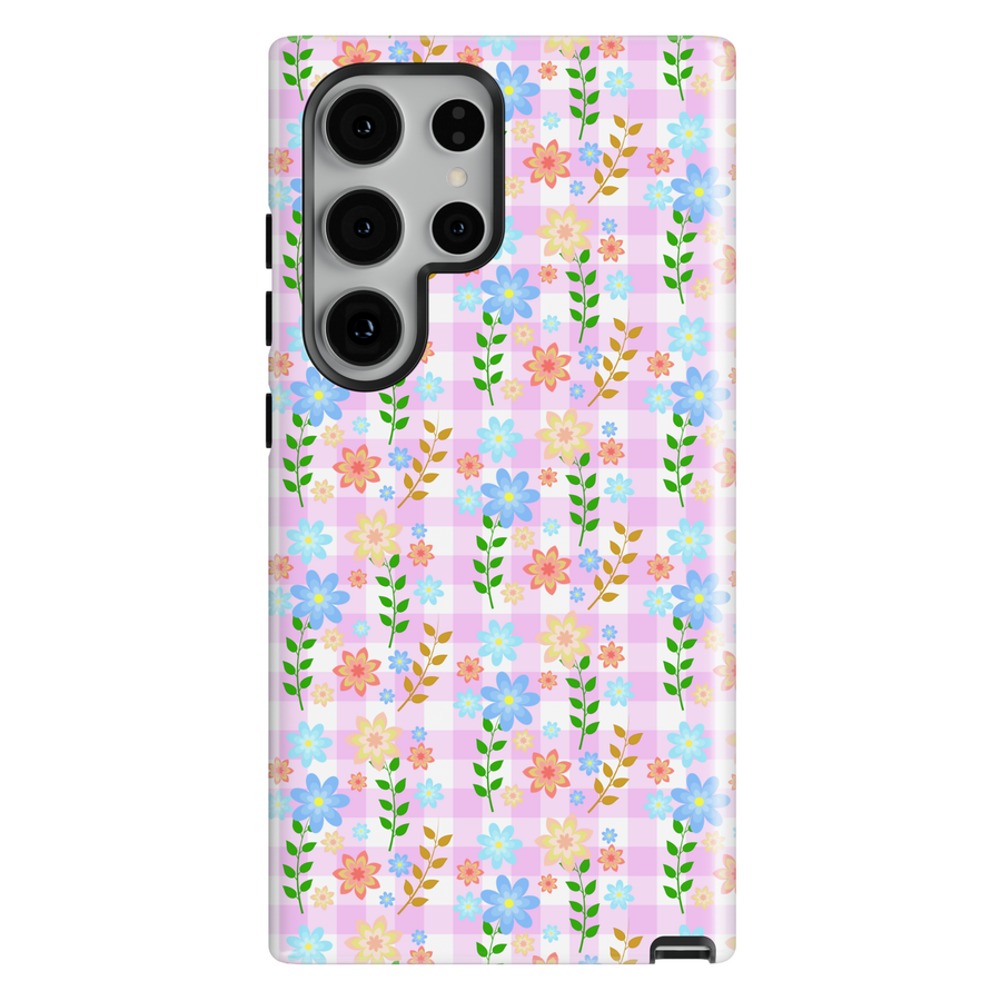 Pastel patchwork floral phone case with quilt-inspired pattern in pink, yellow, green, and blue for iPhone and Samsung