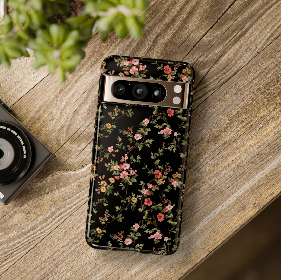 Vintage floral Google Pixel 10 Pro case with delicate pink flowers botanical vines and leaves on black background protective tough case compatible with Pixel 10 Pro Pixel 9 Pro and Pixel 8 Pro elegant botanical phone cover.