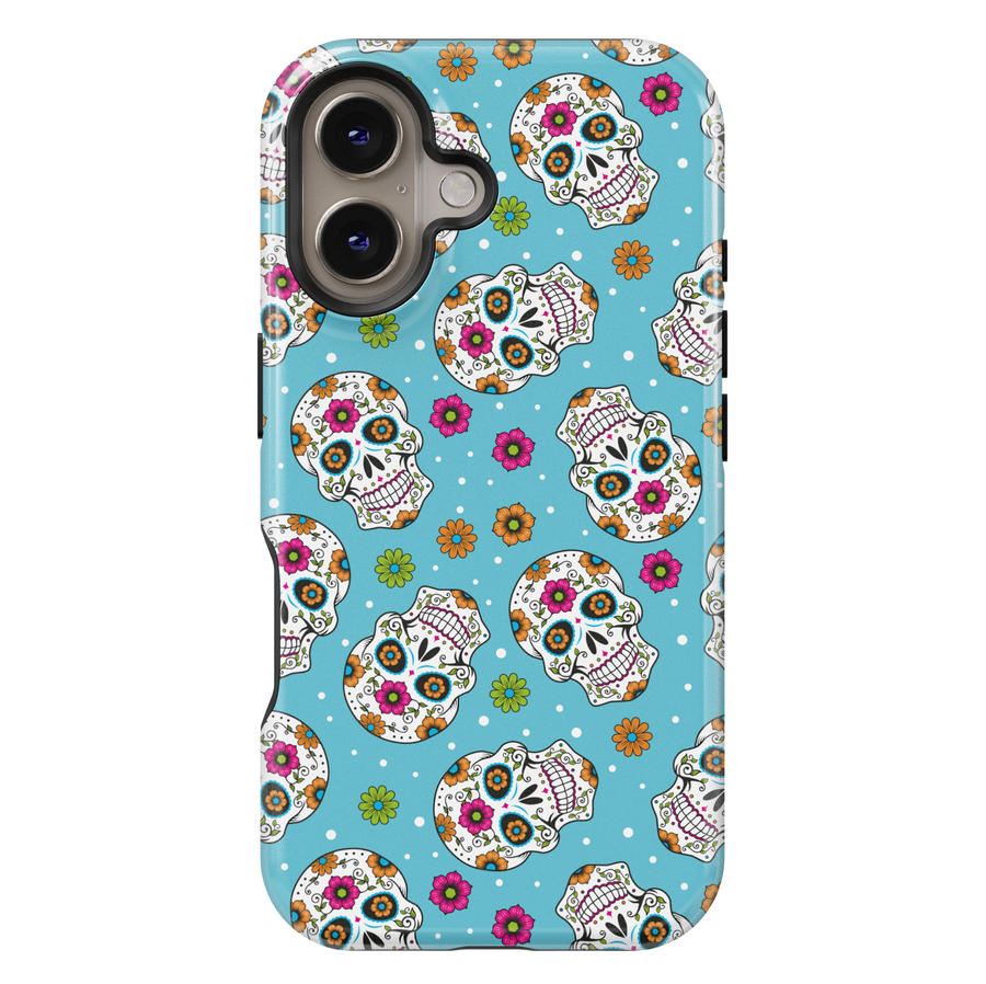 Bright sugar skull iPhone case with vibrant orange, pink, green, and blue floral patterns on a turquoise blue background. Features traditional Day of the Dead (Día de los Muertos) skull art for iPhone 16 Pro Max, 15, 14, and 13 models. Bold, festive, and eye-catching design perfect for Halloween and fall celebrations.

