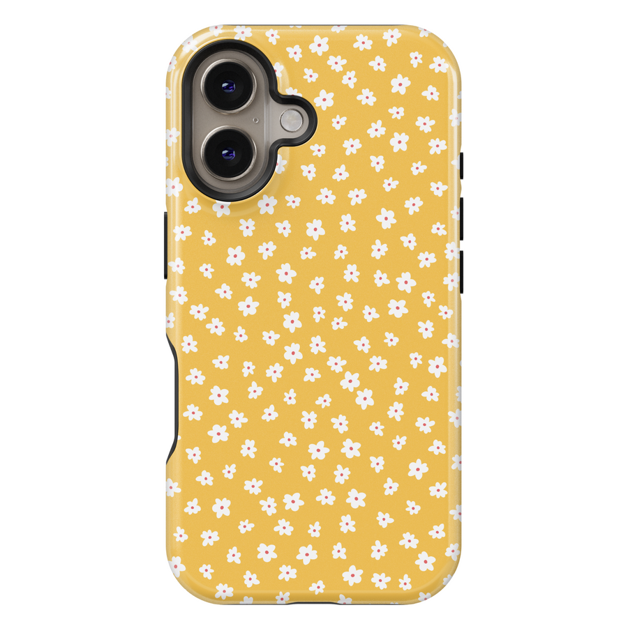 iPhone case featuring a playful mustard yellow background with a scattered pattern of tiny white and pink daisies.