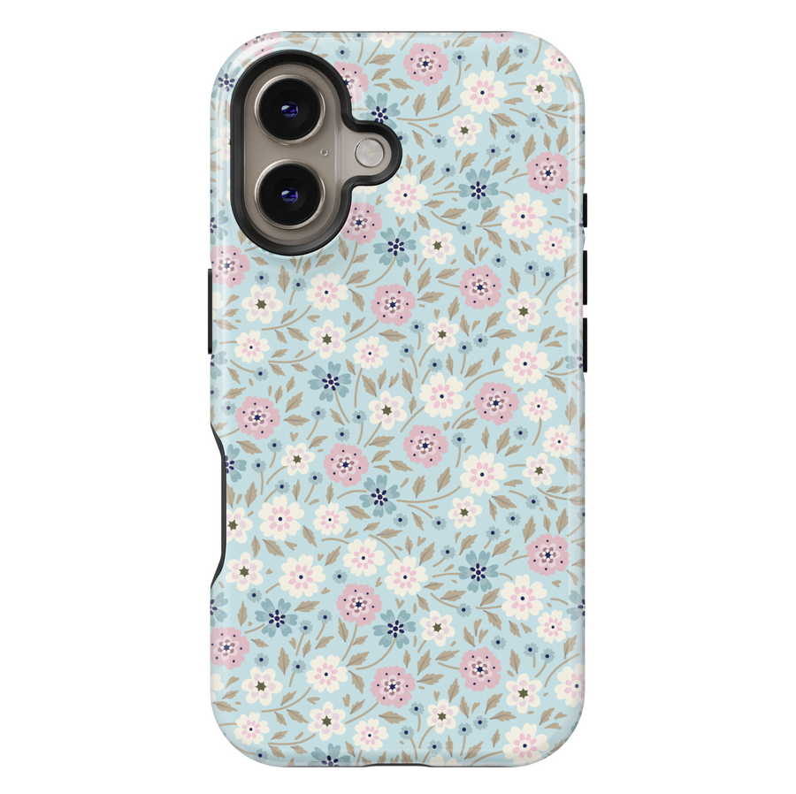iPhone case with a pastel blue background and a dainty floral print in soft pink, white, navy, and taupe tones, creating a sweet and vintage-inspired look.