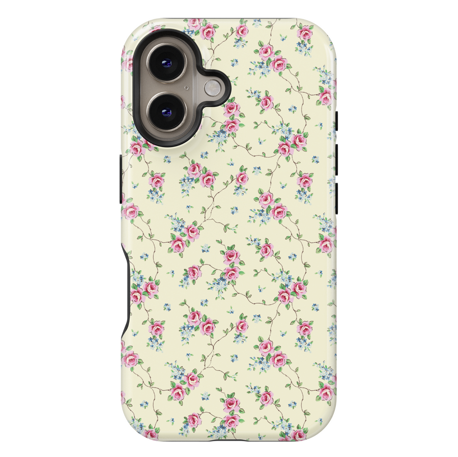 Cream iPhone case adorned with a vintage-inspired pattern of delicate pink roses and tiny blue florals connected by thin trailing vines, creating a romantic, timeless aesthetic.