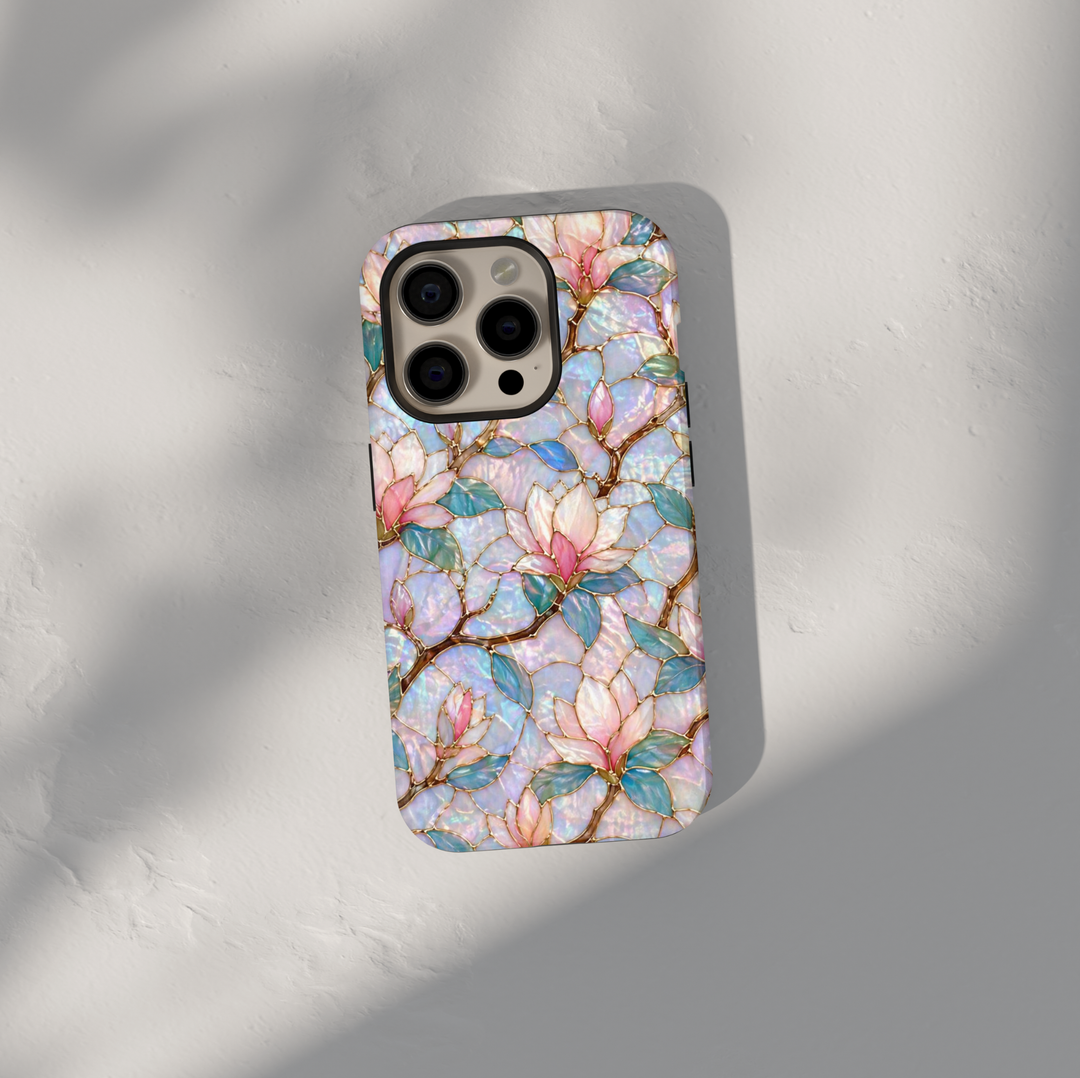 Magnolia floral Samsung Galaxy S26 Ultra case with iridescent pearl tones and gold-lined stained glass design.